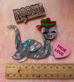 Nessie brooch or necklace.