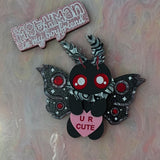 Mothman brooch or necklace.