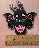 Mothman brooch or necklace.