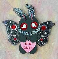 Mothman brooch or necklace.