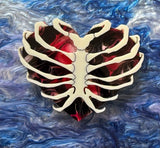 Rib cage brooch